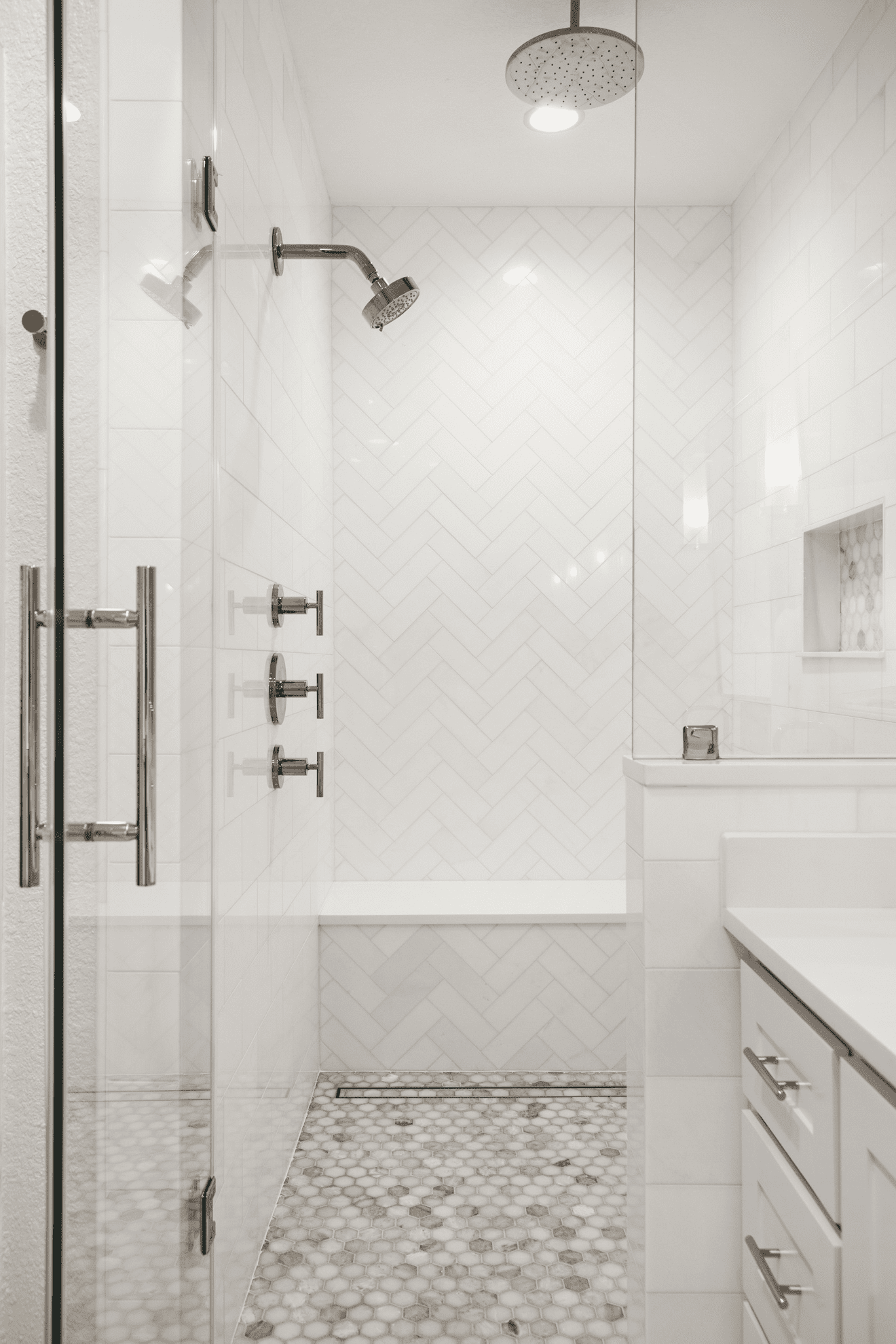 Walk-in shower with marble bench