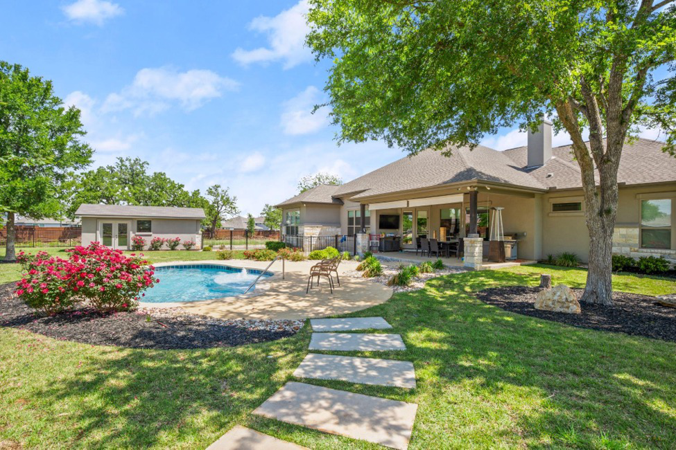 Outdoor living space with a swimming pool