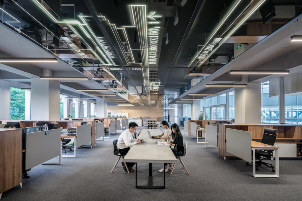 People working on their laptops in an office environment