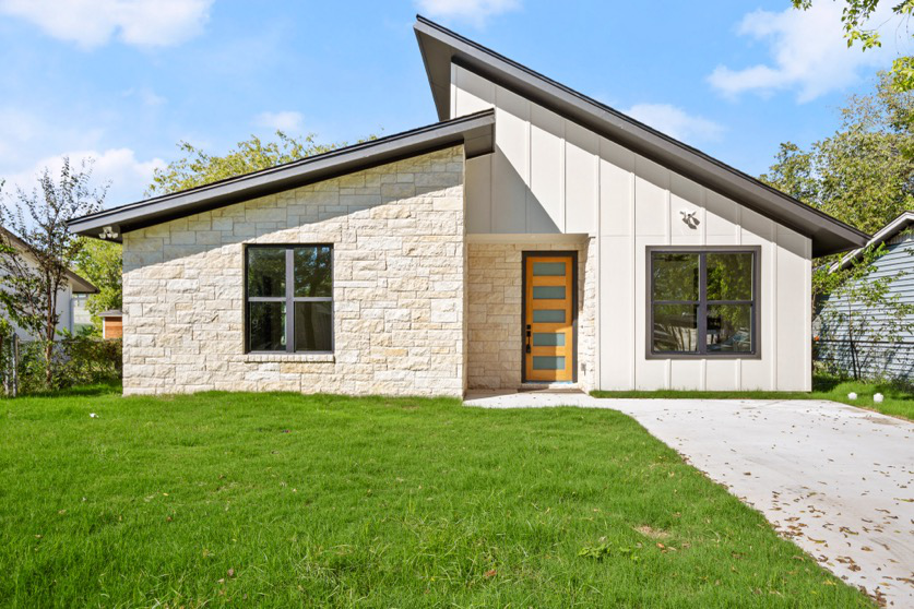 A home renovation project of a ranch-style home with limestone brick.