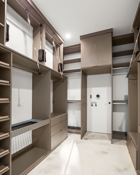 A utility room built out with shelves