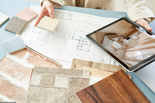 Asian interior designer thinking about home interior